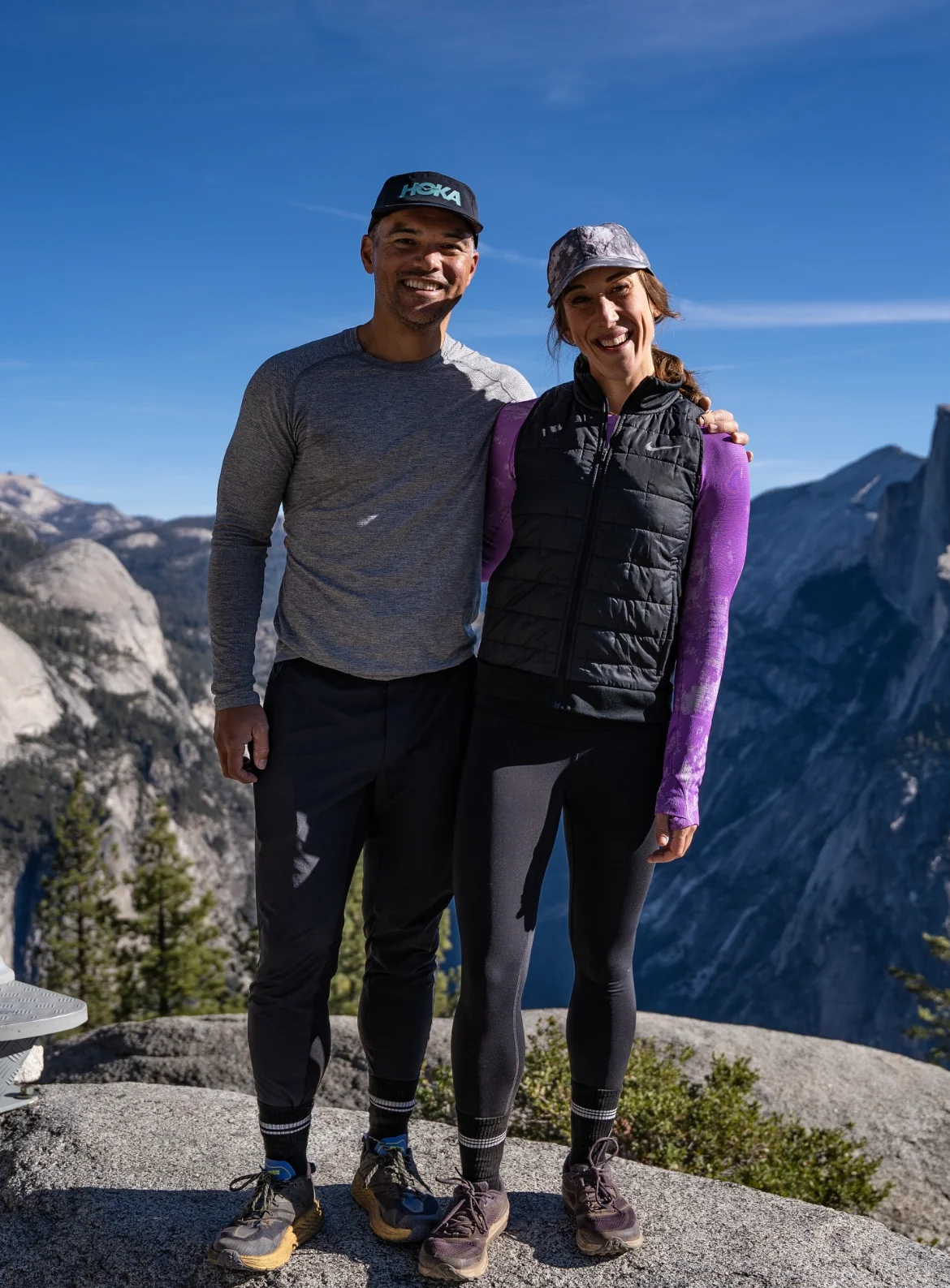 Mackie and Juliet together on a mountain summit